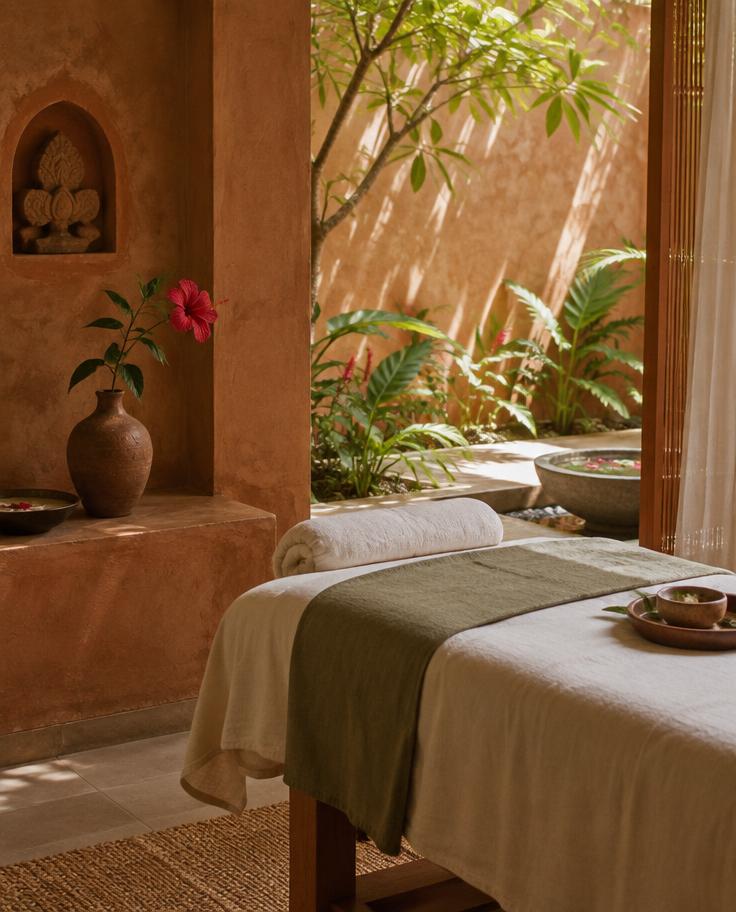 Warm, peaceful treatment room at Hibiscus Wellness Spa